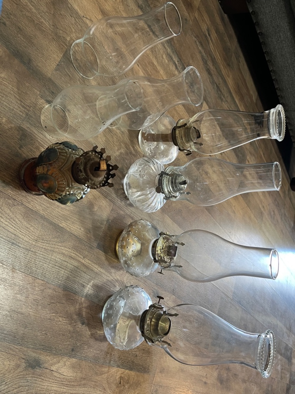 Collection of Vintage Clear Glass Oil Lamp Chimneys and Bases